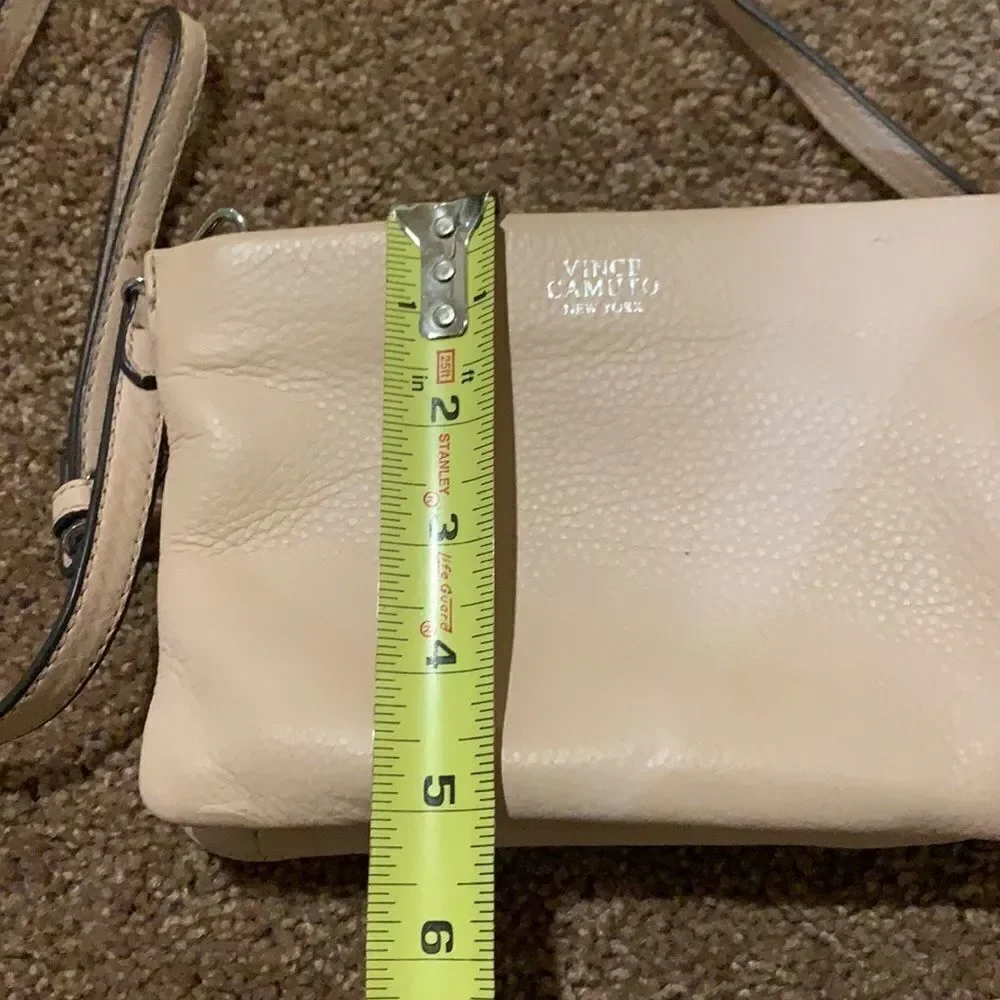 Vince Camuto soft pink crossbody wristlet.